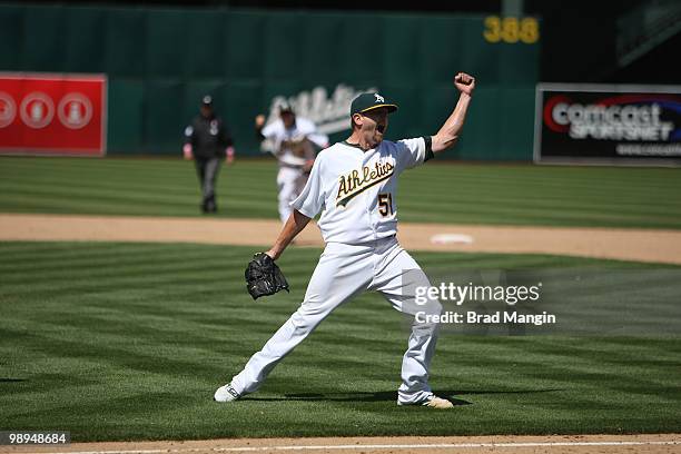 Dallas Braden of the Oakland Athletics celebrates his perfect game after the game between the Tampa Bay Rays and the Oakland Athletics on Sunday, May...