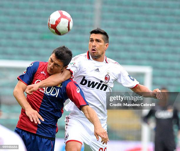 Salvatore Bocchetti of Genoa CFC goes up for the ball against Marco Borriello of AC Milan during the Serie A match between Genoa CFC and AC Milan at...