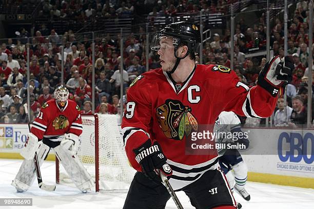 Jonathan Toews of the Chicago Blackhawks looks for the puck at Game Two of the Western Conference Semifinals against the Vancouver Canucks during the...