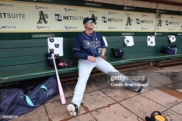 Evan Longoria of the Tampa Bay Rays gets ready in the dugout before the game between the Tampa Bay Rays and the Oakland Athletics on Sunday, May 9 at...