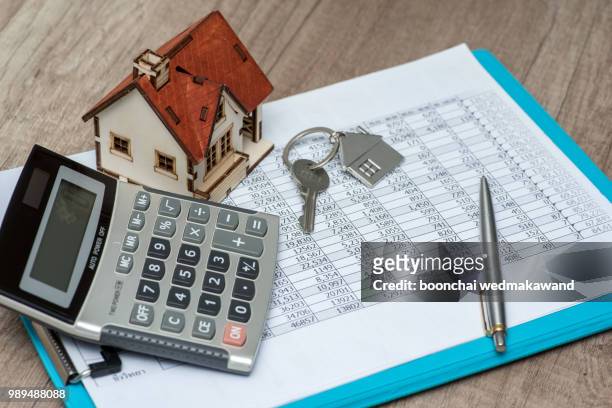 sign for your house - signing mortgage stock pictures, royalty-free photos & images