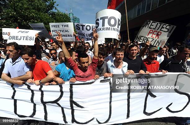 Some 2,000 ethnic Albanian protesters march in front of the Criminal Court, the Parliament of the Republic of Macedonia and the Government building...