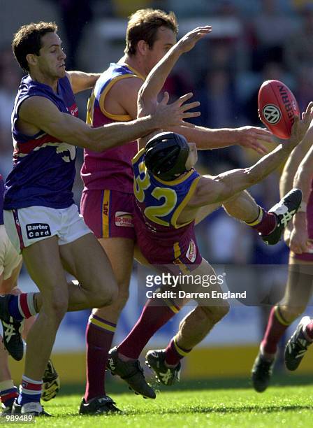 Shaun Hart of Brisbane takes a mark under pressure against the Bulldogs during the round 18 AFL match between the Brisbane Lions and the Western...