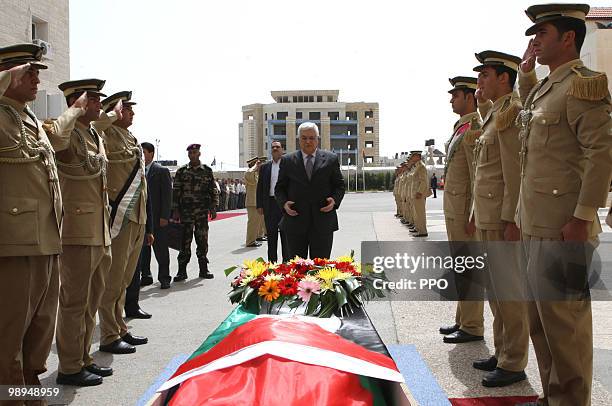 In this handout image supplied by the Palestinian Press Office , Palestinian President Mahmoud Abbas attends the funeral of Ramadan Al-Bata on May...