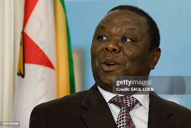 Zimbabwean Prime Minister Morgan Tsvangirai speaks alongside US Secretary of State Hillary Clinton prior to meetings at the State Department in...