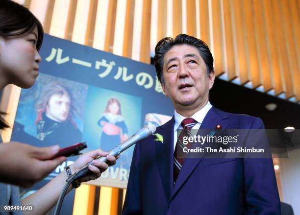 Japanese Prime Minister Shinzo Abe visits the 'Art of Portraiture in the Louvre Collections' at the National Art Center, Tokyo on July 1, 2018 in...