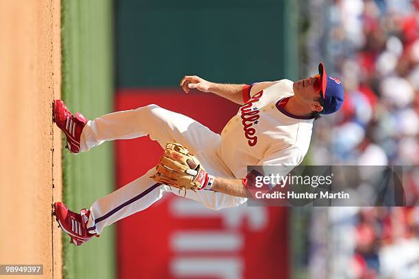 Second baseman Chase Utley of the Philadelphia Phillies sets in fielding position during a game against the St. Louis Cardinals at Citizens Bank Park...