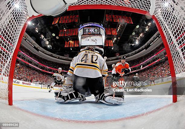 Arron Asham of the Philadelphia Flyers attempts to slap a rebound past goaltender Tuukka Rask of the Boston Bruins with 10:43 remaining in the first...