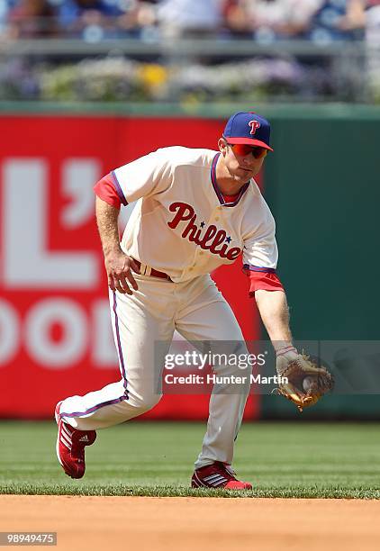 Second baseman Chase Utley of the Philadelphia Phillies fields a ground ball during a game against the St. Louis Cardinals at Citizens Bank Park on...