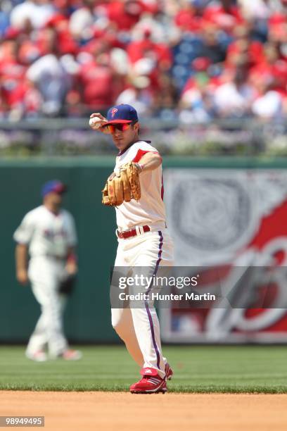 Second baseman Chase Utley of the Philadelphia Phillies throws to first base during a game against the St. Louis Cardinals at Citizens Bank Park on...