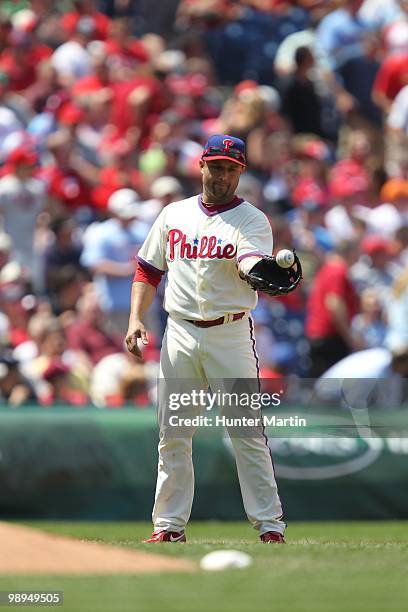 Third baseman Placido Polanco of the Philadelphia Phillies fields a ground ball during a game against the St. Louis Cardinals at Citizens Bank Park...