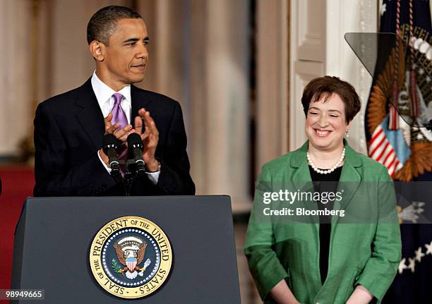 Elena Kagan, U.S. Solicitor general, right, smiles while being introduced by U.S. President Barack Obama in the East Room of the White House in...