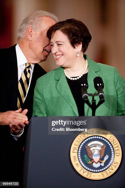 Vice President Joseph "Joe" Biden, left, talks to Elena Kagan, U.S. Solicitor general, during a news conference in the East Room of the White House...