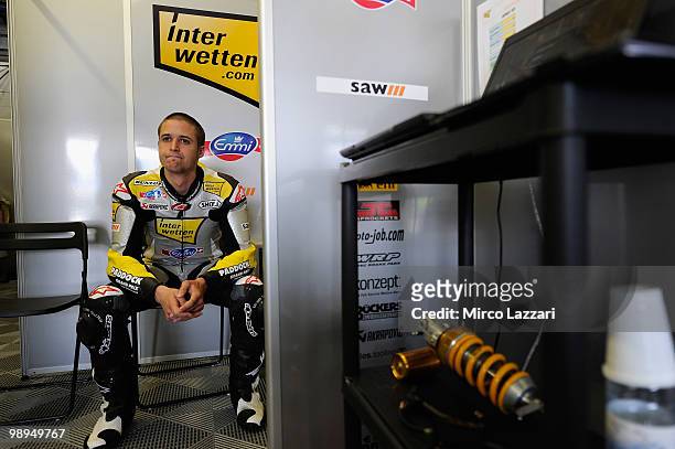 Thomas Luthi of Switzerland and Interwetten Moriwaki Racing looks on in box during the second day of test at Circuito de Jerez on May 1, 2010 in...