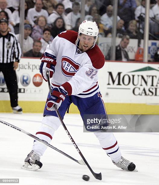 Travis Moen of the Montreal Canadiens takes a shot on goal against the Pittsburgh Penguins in Game Five of the Eastern Conference Semifinals during...
