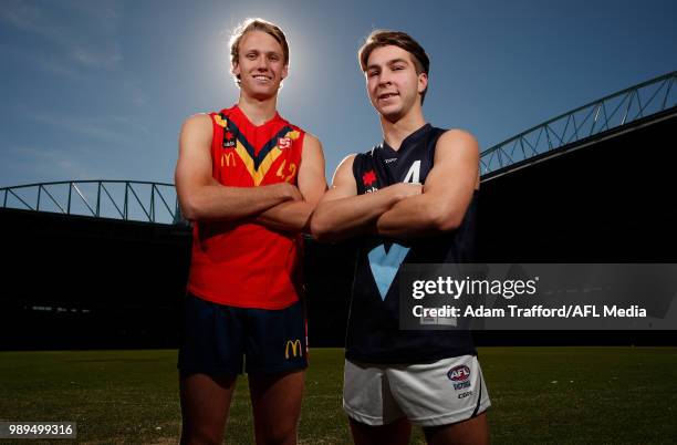 Rhylee West of Vic Metro and Jack Lukosius of South Australia pose for a photo ahead of the Grand Final match between the two teams to be held at...