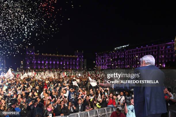 Newly elected Mexico's President Andres Manuel Lopez Obrador, running for "Juntos haremos historia" party, cheers his supporters at the Zocalo Square...