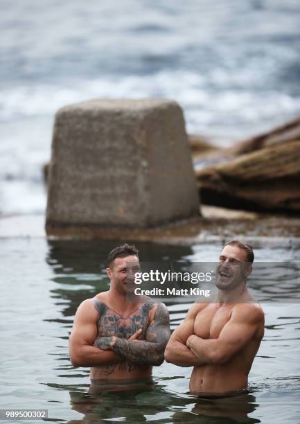 Tariq Sims and Jack de Belin swim during a New South Wales Blues State of Origin Recovery Session at Coogee Beach on July 2, 2018 in Sydney,...