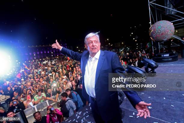 Newly elected Mexico's President Andres Manuel Lopez Obrador, running for "Juntos haremos historia" party, cheers his supporters at the Zocalo Square...
