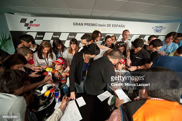 Dani Pedrosa of Spain and Repsol Honda Team and Jorge Lorenzo of Spain and Fiat Yamaha Team speak with journalists after the press conference after...