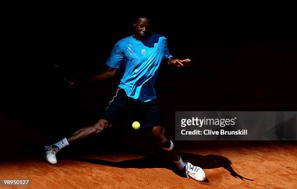 Gael Monfils of France plays a forehand against Stephane Robert of France in their first round match during the Mutua Madrilena Madrid Open tennis...