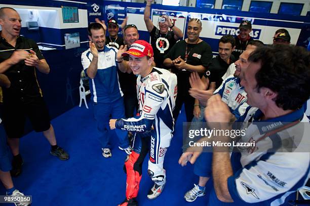 Jorge Lorenzo of Spain and Fiat Yamaha Team celebrates in box with the team after the MotoGP race at Circuito de Jerez on May 2, 2010 in Jerez de la...