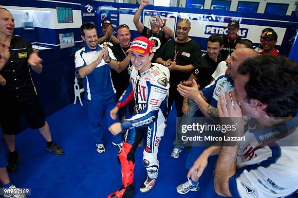 Jorge Lorenzo of Spain and Fiat Yamaha Team celebrates in box with the team after the MotoGP race at Circuito de Jerez on May 2, 2010 in Jerez de la...