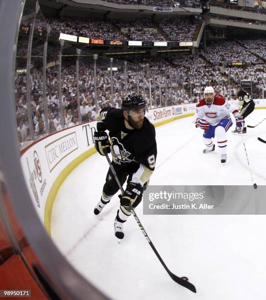 Pascal Dupuis of the Pittsburgh Penguins handles the puck against the Montreal Canadiens in Game Five of the Eastern Conference Semifinals during the...