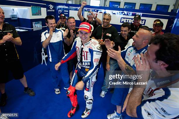 Jorge Lorenzo of Spain and Fiat Yamaha Team celebrates in box with the team after the MotoGP race at Circuito de Jerez on May 2, 2010 in Jerez de la...