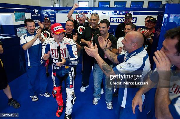 Jorge Lorenzo of Spain and Fiat Yamaha Team celebrates in box with the team after the MotoGP race at Circuito de Jerez on May 2, 2010 in Jerez de la...