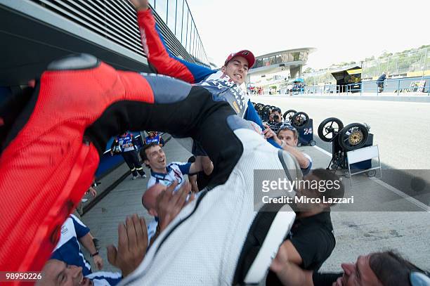 Jorge Lorenzo of Spain and Fiat Yamaha Team celebrates in box with the team after the MotoGP race at Circuito de Jerez on May 2, 2010 in Jerez de la...