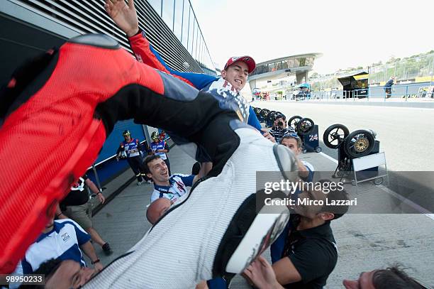 Jorge Lorenzo of Spain and Fiat Yamaha Team celebrates in box with the team after the MotoGP race at Circuito de Jerez on May 2, 2010 in Jerez de la...