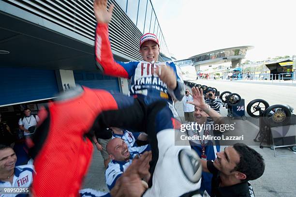 Jorge Lorenzo of Spain and Fiat Yamaha Team celebrates in box with the team after the MotoGP race at Circuito de Jerez on May 2, 2010 in Jerez de la...