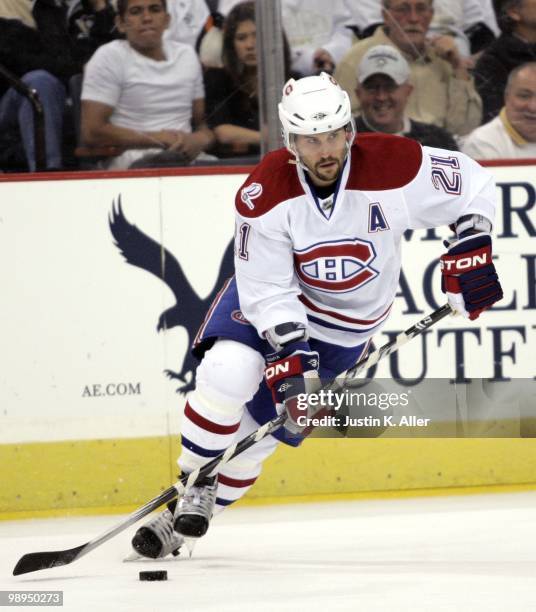 Brian Gionta of the Montreal Canadiens handles the puck against the Pittsburgh Penguins in Game Five of the Eastern Conference Semifinals during the...