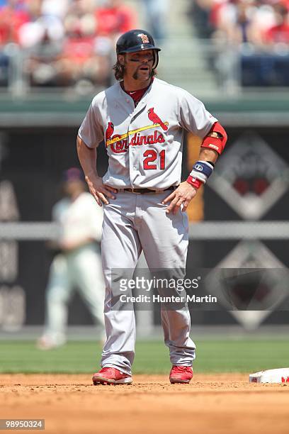 Catcher Jason LaRue of the St. Louis Cardinals takes a lead off second base during a game against the Philadelphia Phillies at Citizens Bank Park on...