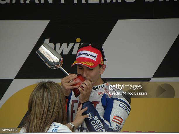 Jorge Lorenzo of Spain and Fiat Yamaha Team celebrates on the podium after the MotoGP race at Circuito de Jerez on May 2, 2010 in Jerez de la...