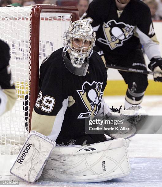 Marc-Andre Fleury of the Pittsburgh Penguins protects the net against the Montreal Canadiens in Game Five of the Eastern Conference Semifinals during...