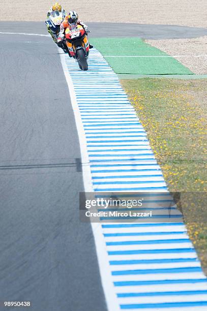 Dani Pedrosa of Spain and Repsol Honda Team leads Valentino Rossi of Italy and Fiat Yamaha Team during the MotoGP race at Circuito de Jerez on May 2,...