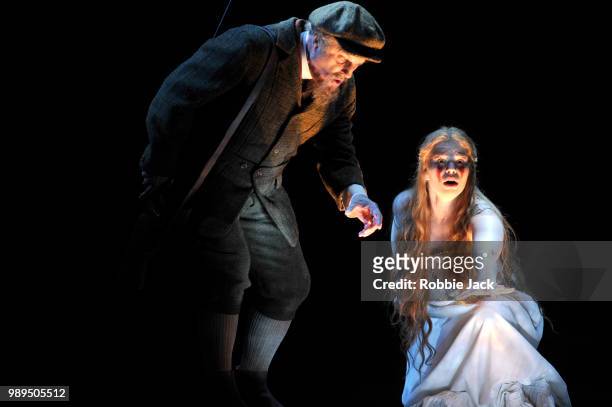 Christopher Purves as Golaud and Christina Gansch as Melisande in Glyndebourne's production of Claude Debussy's Pelleas et Melisande directed by...