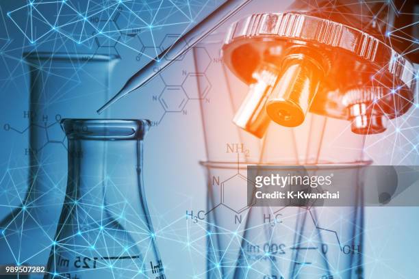 digital composite image of molecular structure with test tubes and equipment - scienza e tecnologia foto e immagini stock