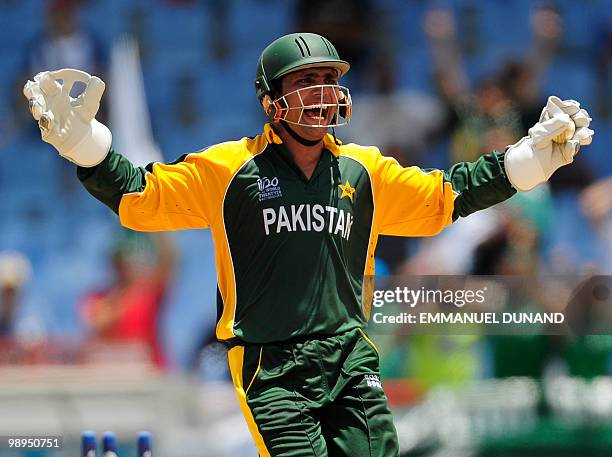 Pakistani wicketkeeper Kamran Akmal celebrates after stumping South African batsman Johan Botha during the ICC World Twenty20 Super Eight match...