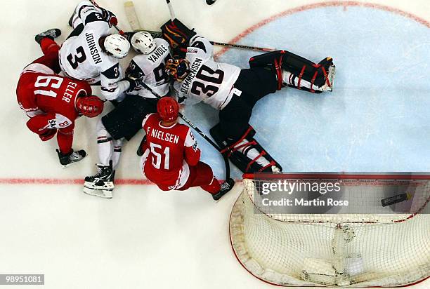 Scott Clemmensen, goalkeeper of USA saves the shot of Lars Eller of Denmark during the IIHF World Championship group A match between USA and Denmark...