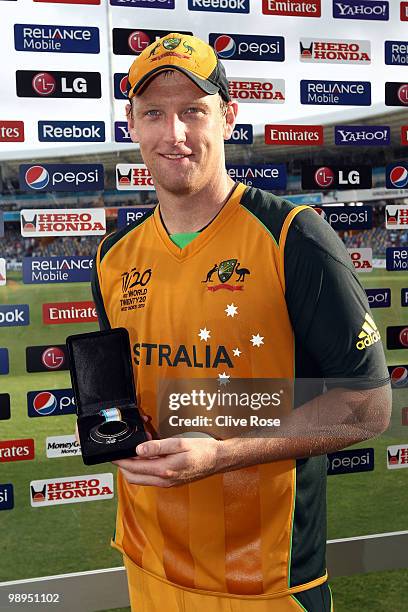 Cameron White of Australia poses with his man of the match award after the ICC World Twenty20 Super Eight match between Sri Lanka and Australia at...