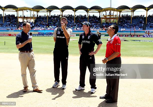 Paul Collingwood looks on as Daniel Vettori of New Zealand tosses the coin before the ICC World Twenty20 Super Eight match between England and New...