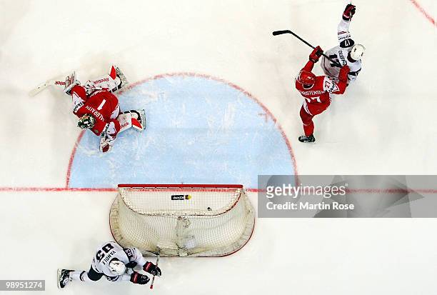 Jack Hillen of USA celebrates after scoring during the IIHF World Championship group A match between USA and Denmark at Lanxess Arena on May 10, 2010...