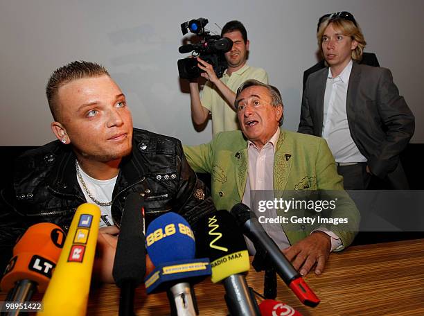 Menowin Froehlich and Richard Lugner attend a press conference at Lugner City on May 10, 2010 in Vienna, Austria.