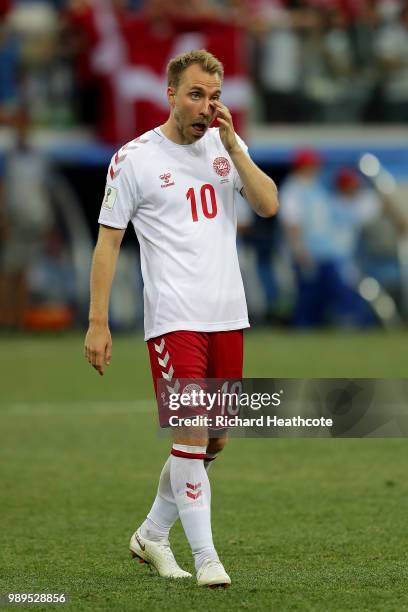 Christian Eriksen of Denmark looks dejected as the lose on penalties to Croatia during the 2018 FIFA World Cup Russia Round of 16 match between...