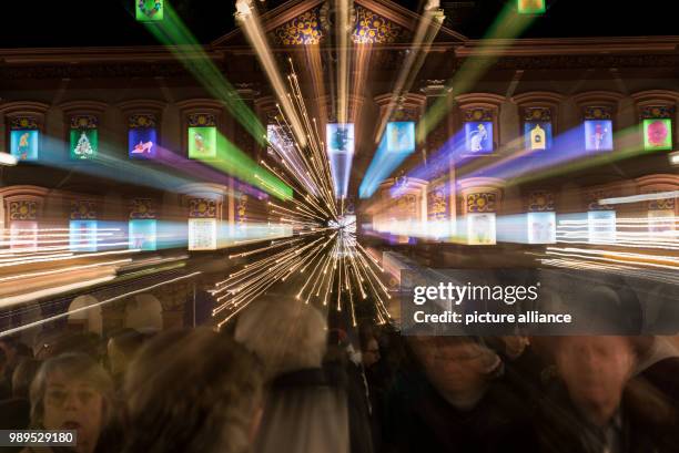 All the windows are illuminated on an oversized Advent calendar at the historic town hall in Gengenbach, Germany, 23 December 2017. This year,...