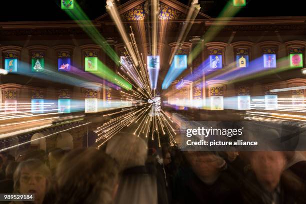 Dpatop - All the windows are illuminated on an oversized Advent calendar at the historic town hall in Gengenbach, Germany, 23 December 2017. This...