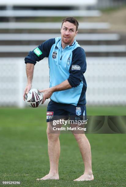 James Maloney takes part in a drill in bare feet during a New South Wales Blues State of Origin Recovery Session at Coogee Oval on July 2, 2018 in...